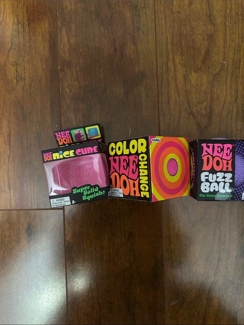 (3) Nee Doh Squishies.   Pink Nice Cube, Pink Color Change and Purple Fuzz Ball